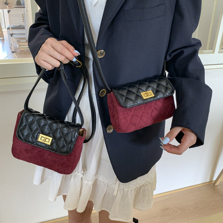 Women elegant shoulder bag with matte finish and textured design