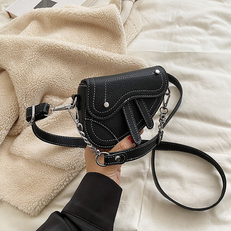 Women's mini handbag in modern, structured design