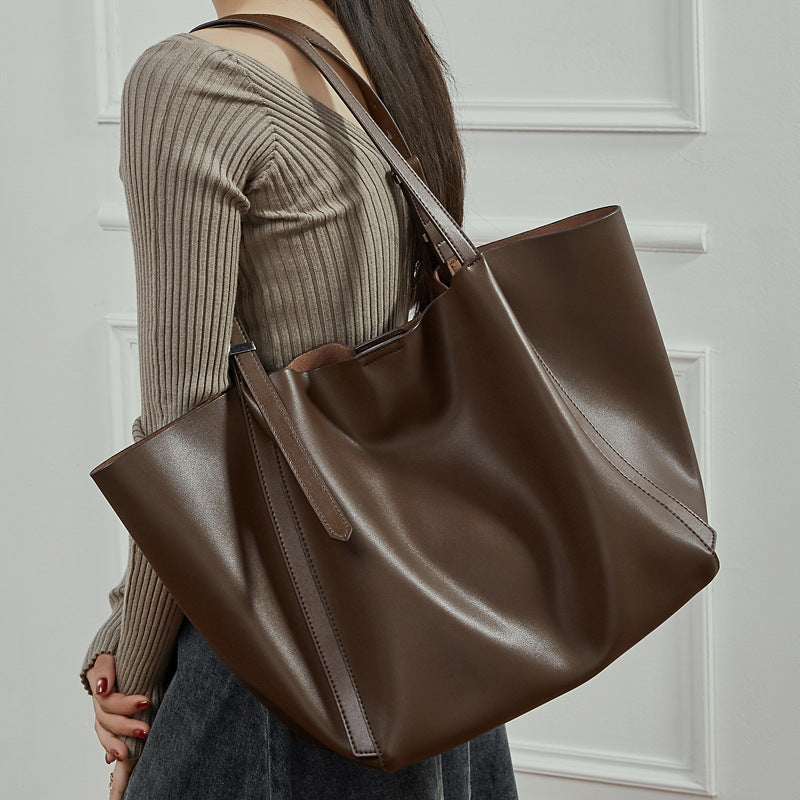Women's tote bag with elegant design and removable shoulder strap