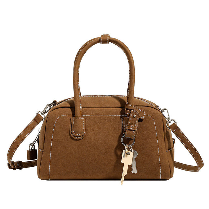 Women's handbag with removable and adjustable shoulder strap