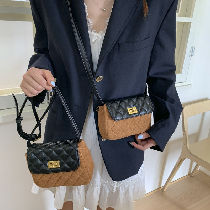 Women elegant shoulder bag with matte finish and textured design
