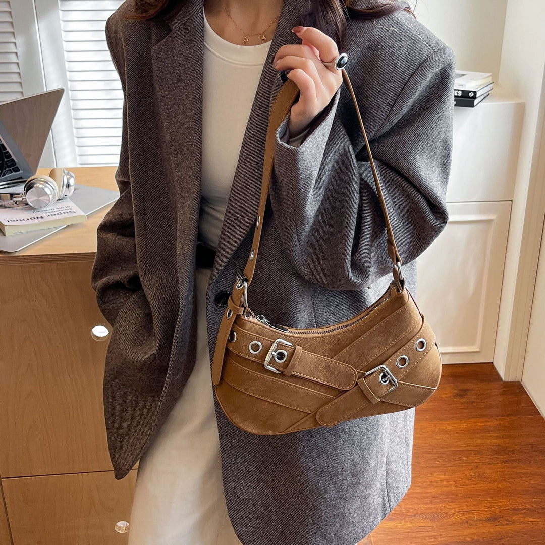 Women's fashionable shoulder bag made of soft suede leather with unique appliqué