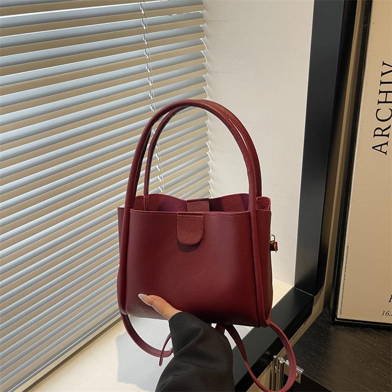 Ladies elegant mini handbag with practical flap closure
