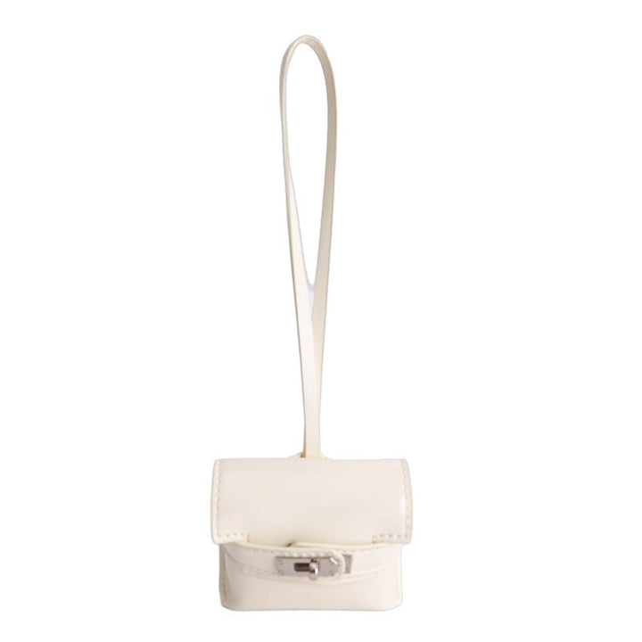 Ladies mini handbag made of high-quality artificial leather with playful closure