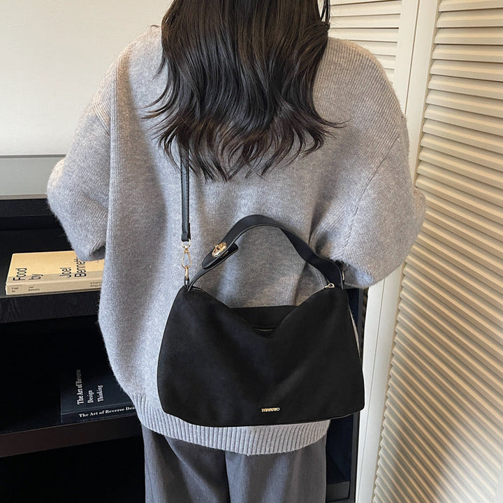 Women's practical shoulder bag made of soft suede