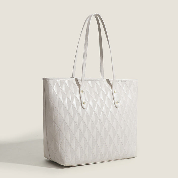 Women's tote bag with elegant diamond design and practical inner compartments