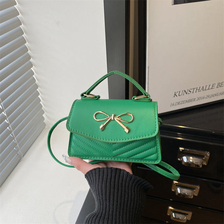 Women’s mini handbag with elegant bow decoration