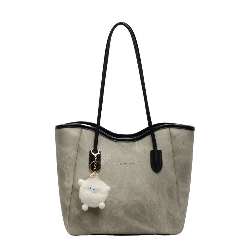 Women's Tote Bag with playful faux fur pendant