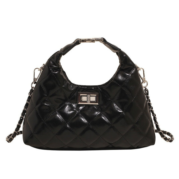 Women's mini bag with elegant quilted design and chic chain closure