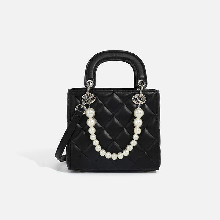 Ladies mini handbag with pearl-embellished chain and quilted design