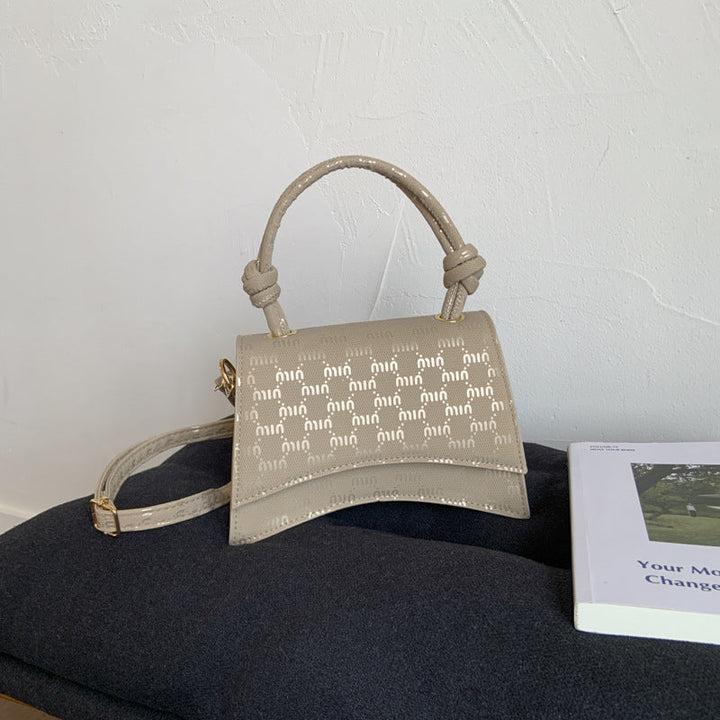 Ladies Mini-Handbag with sophisticated logo design