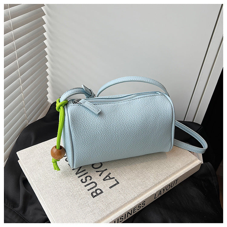 Women's Shoulder Bag made of high-quality synthetic leather with colorful drawstring