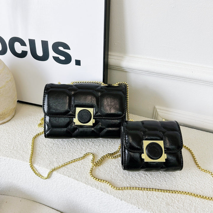 Ladies elegant wrist bag with coordinated mini wallet