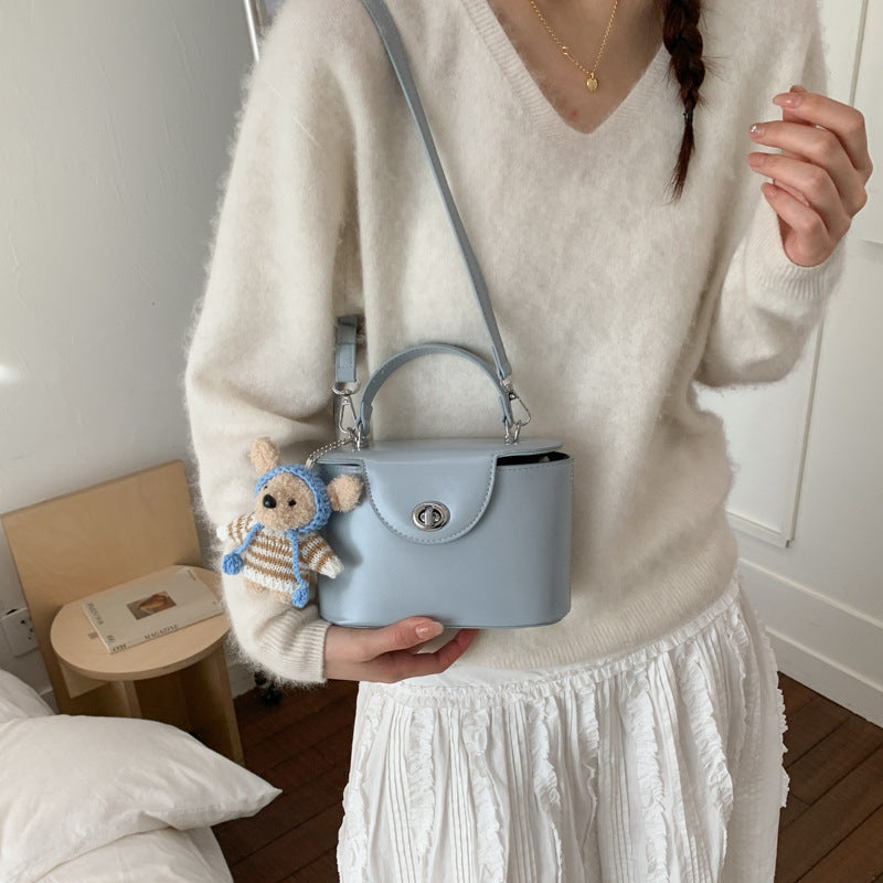 Women’s mini handbag with cute animal pendant