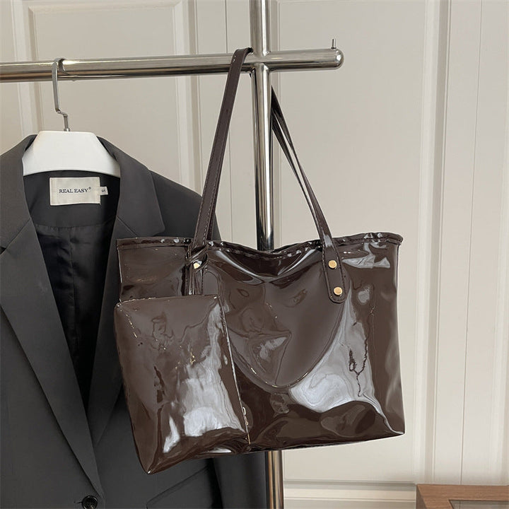 Women's elegant patent leather tote with removable interior compartment