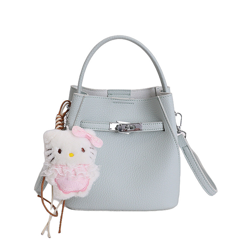 Women's mini handbag with cute charm