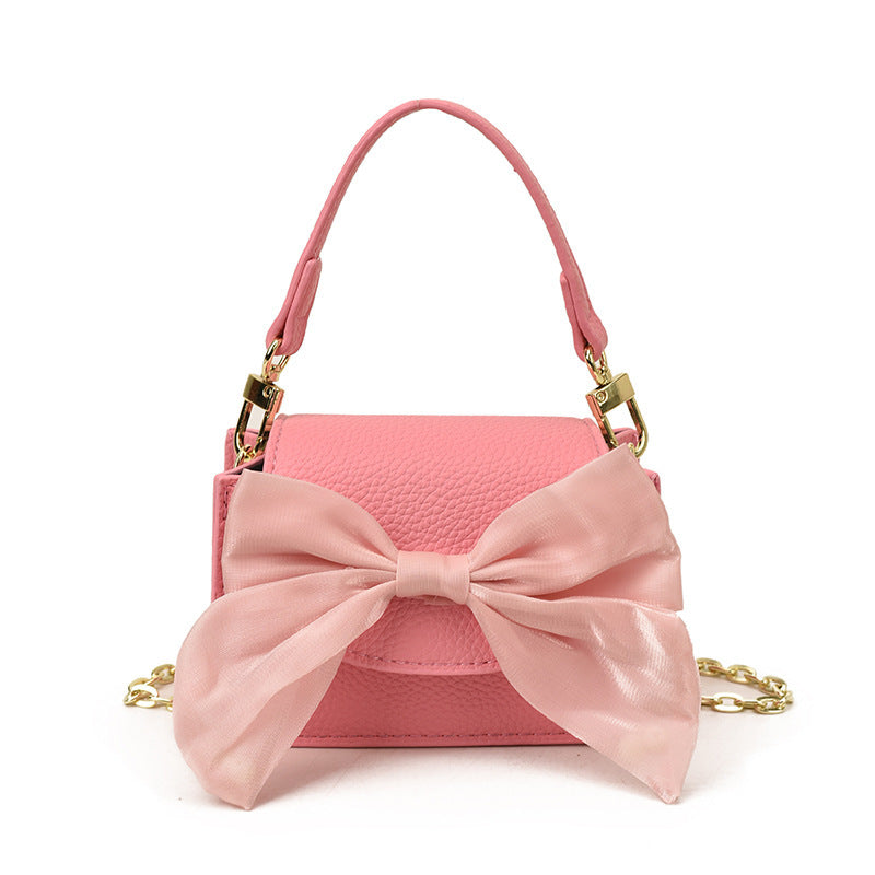 Ladies mini handbag with decorative bow design