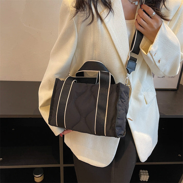 Women's practical shoulder bag with structured details