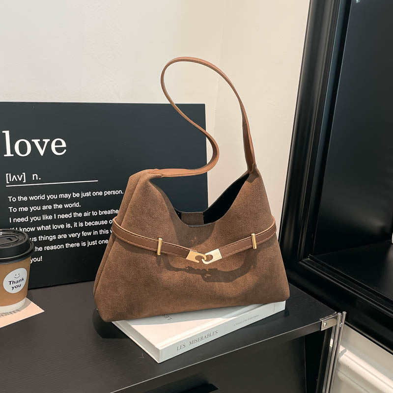 Ladies fashionable suede shoulder bag with contrasting strap