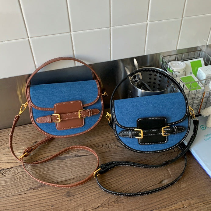 Women’s shoulder bag made of durable denim with leather accents