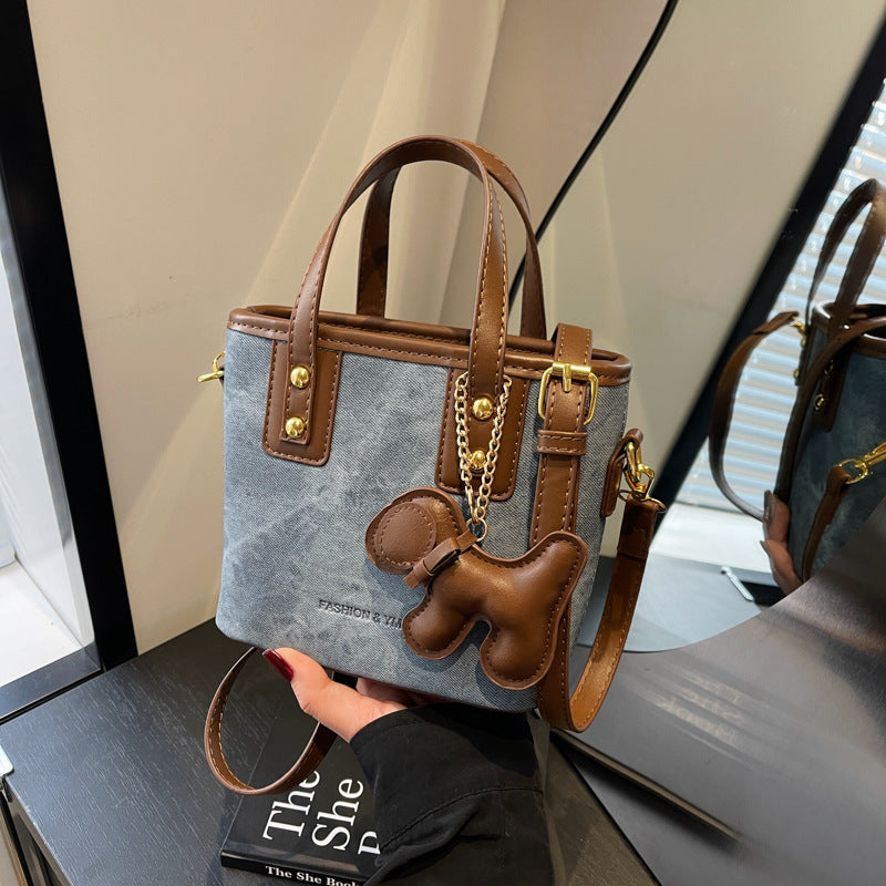 Women's mini bag made of high-quality material with removable funny charm
