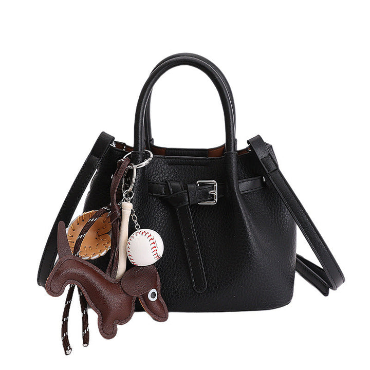 Women Designer Bucket Bag with playful animal charm