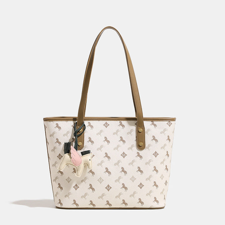 Women's casual tote bag with playful design and detachable pendant