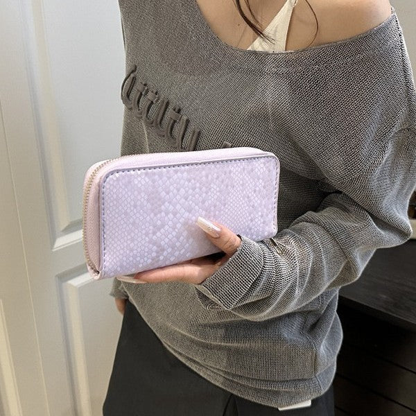 Women's elegant wallet in luxurious snake pattern