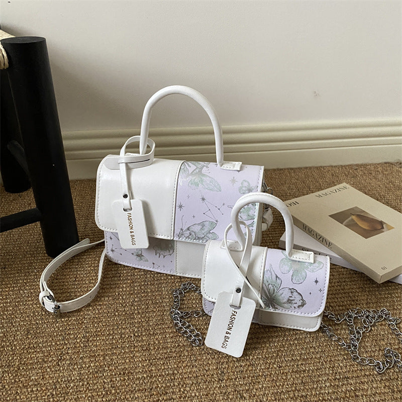 Ladies elegant mini handbag with floral design