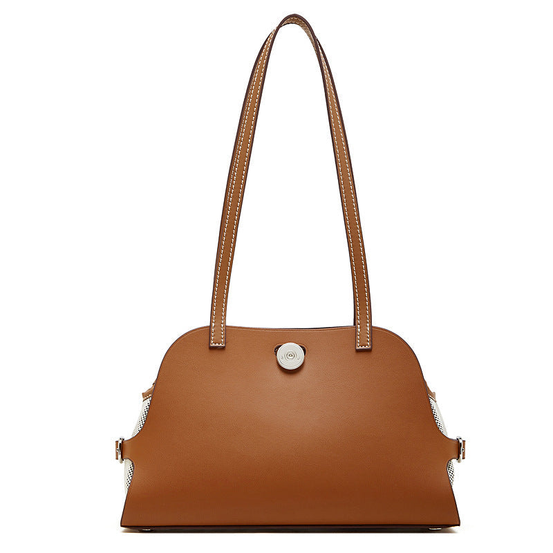Women's tote bag with stylish design and practical compartments