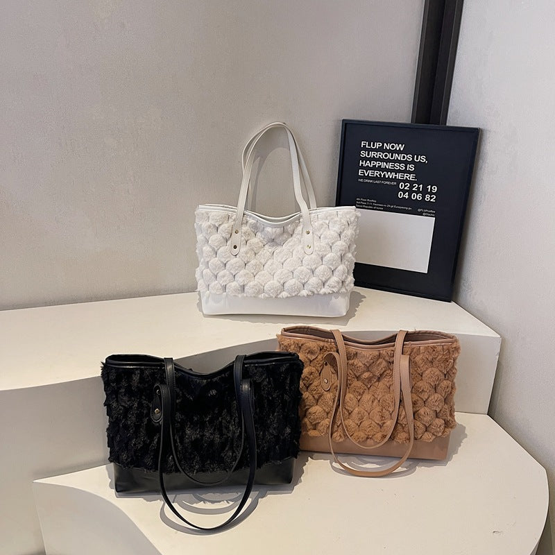 Women's tote bag made of high-quality synthetic leather with textured surface