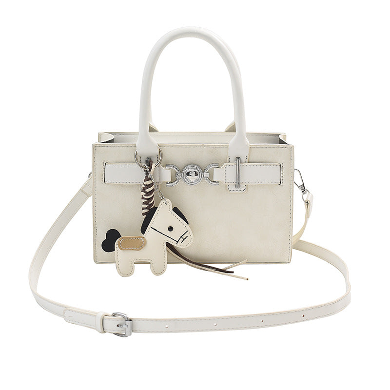 Women's handbag in modern minimalist style with playful charm
