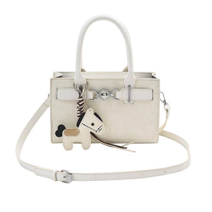Women's handbag in modern minimalist style with playful charm