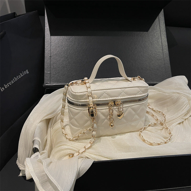 Women’s elegant quilted mini handbag with detachable shoulder strap