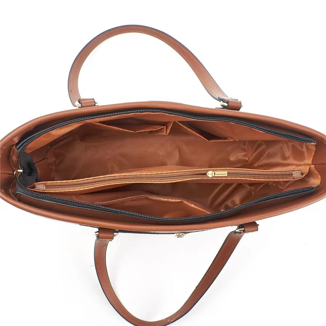 Women's tote bag with textured outer material and removable mini clutch