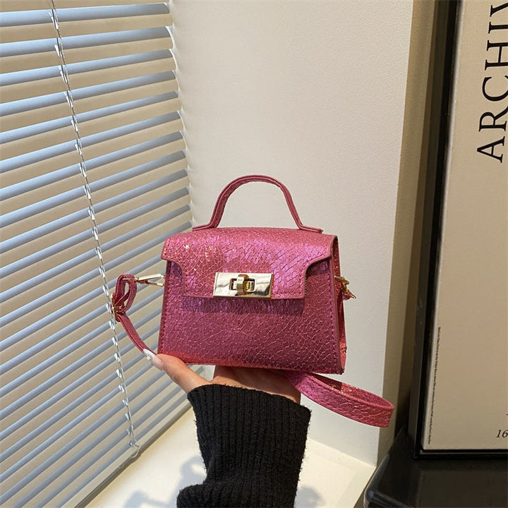 Women's mini handbag in stylish glamour style