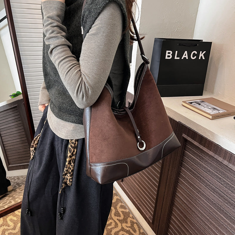 Women's elegant tote bag with authentic suede elements