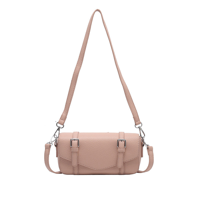 Women's elegant shoulder bag made of textured synthetic leather with adjustable shoulder strap