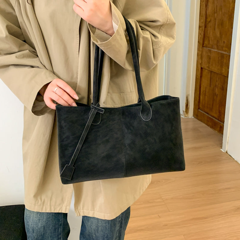 Women's elegant tote bag with shiny detail