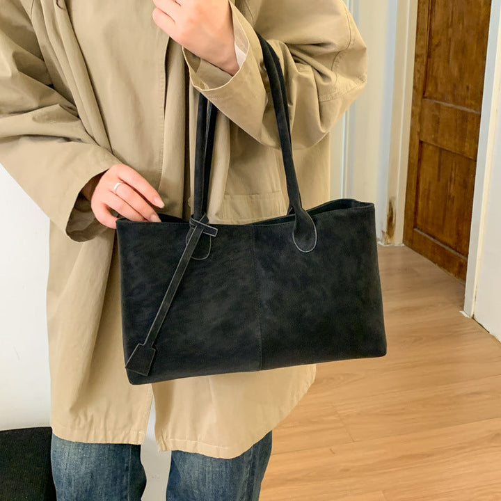Women's elegant tote bag with shiny detail