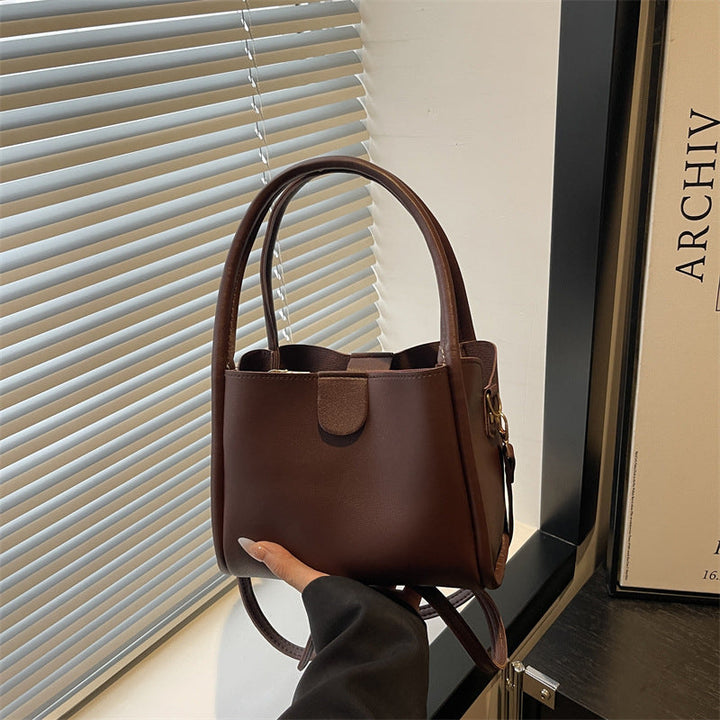 Ladies elegant mini handbag with practical flap closure