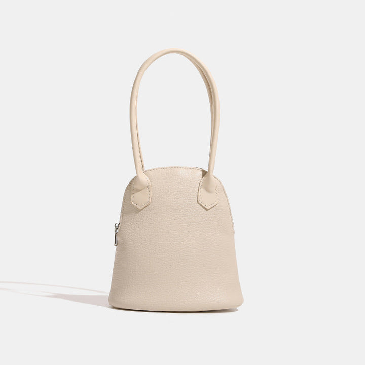 Women's mini handbag in modern design with practical zipper