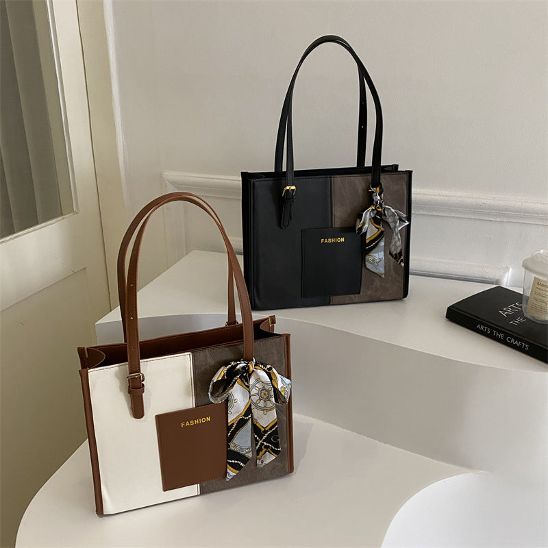 Women's tote bag with fashionable design and decorative silk ribbon