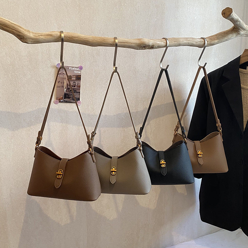 Women's multifunctional shoulder bag with playful charm