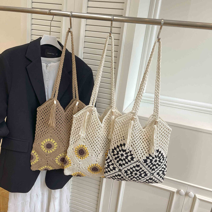 Ladies crocheted shoulder bag with playful sunflower appliqués