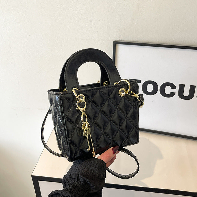 Ladies elegant mini handbag with quilted design