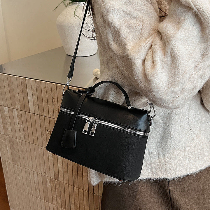 Women's mini shoulder bag with practical compartments