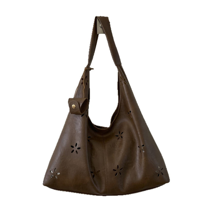 Women's hobo bag with floral design and practical mini organizer