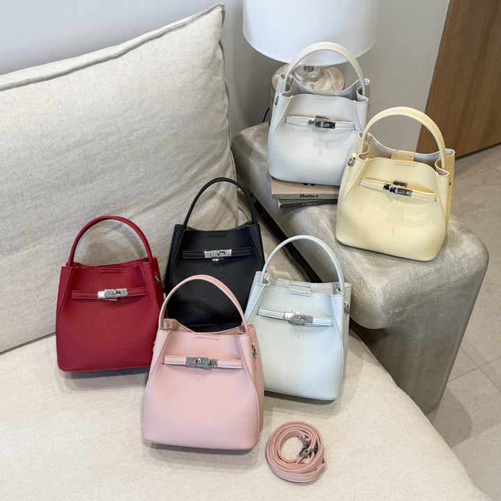 Women's mini handbag with cute charm