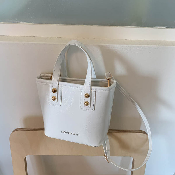 Women’s mini handbag with elegant chain closure